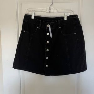 Black American eagle jean skirt.